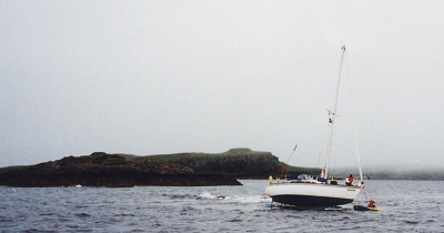 Loading the anchor into the dinghy